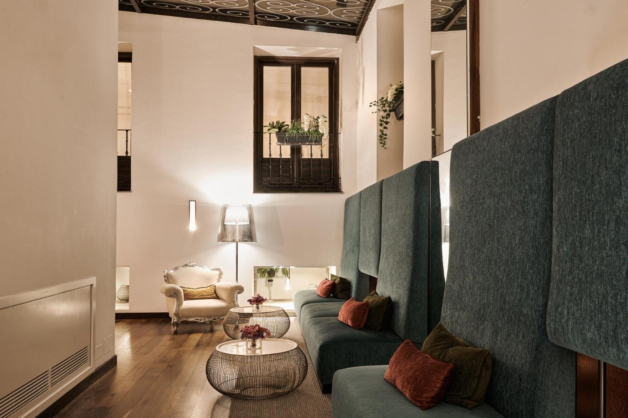 Hotel Hospes Puerta de Alcalá Madrid Esterno foto The interior of the hotel