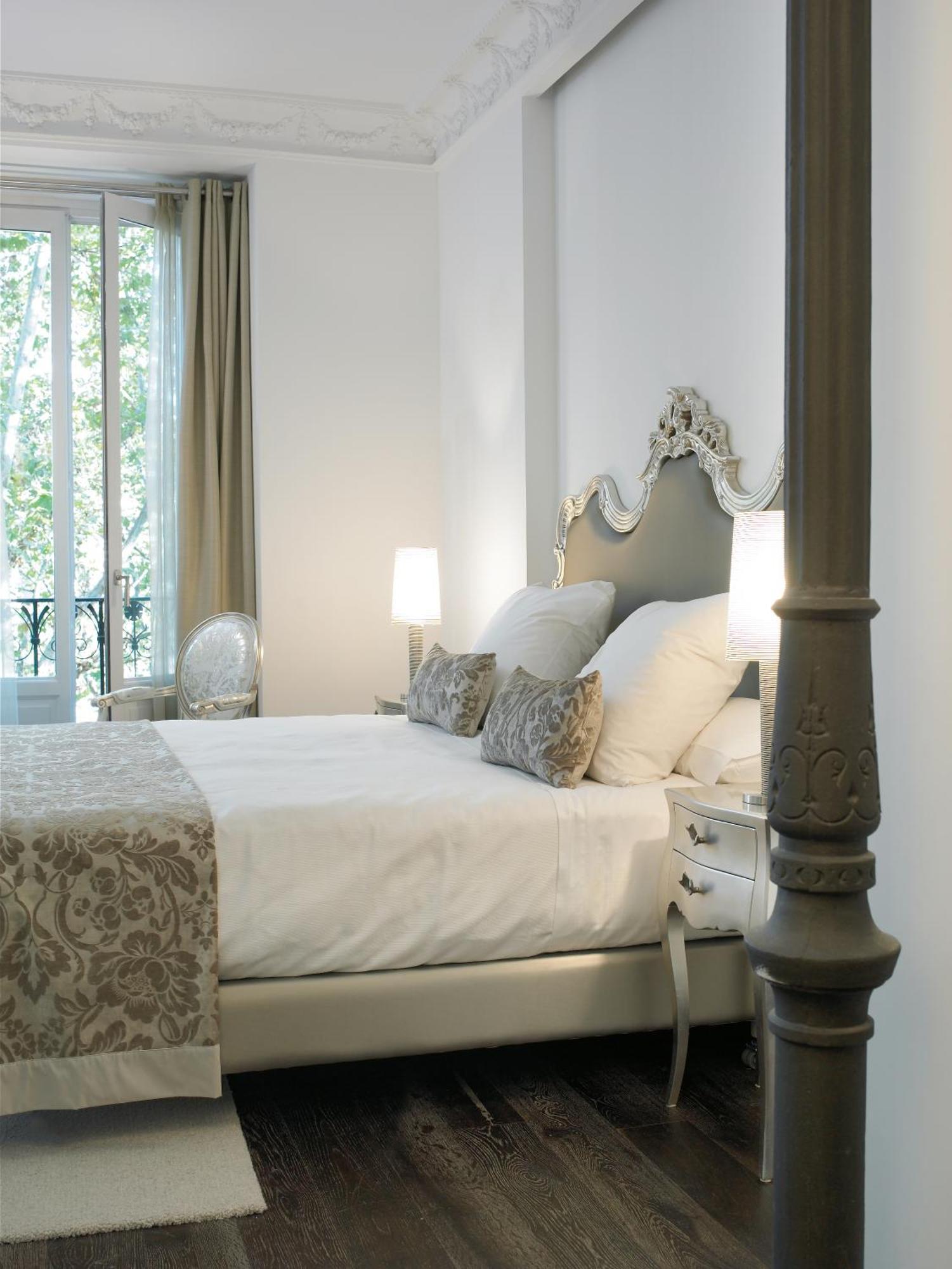 Hotel Hospes Puerta de Alcalá Madrid Camera foto A bedroom at the hotel
