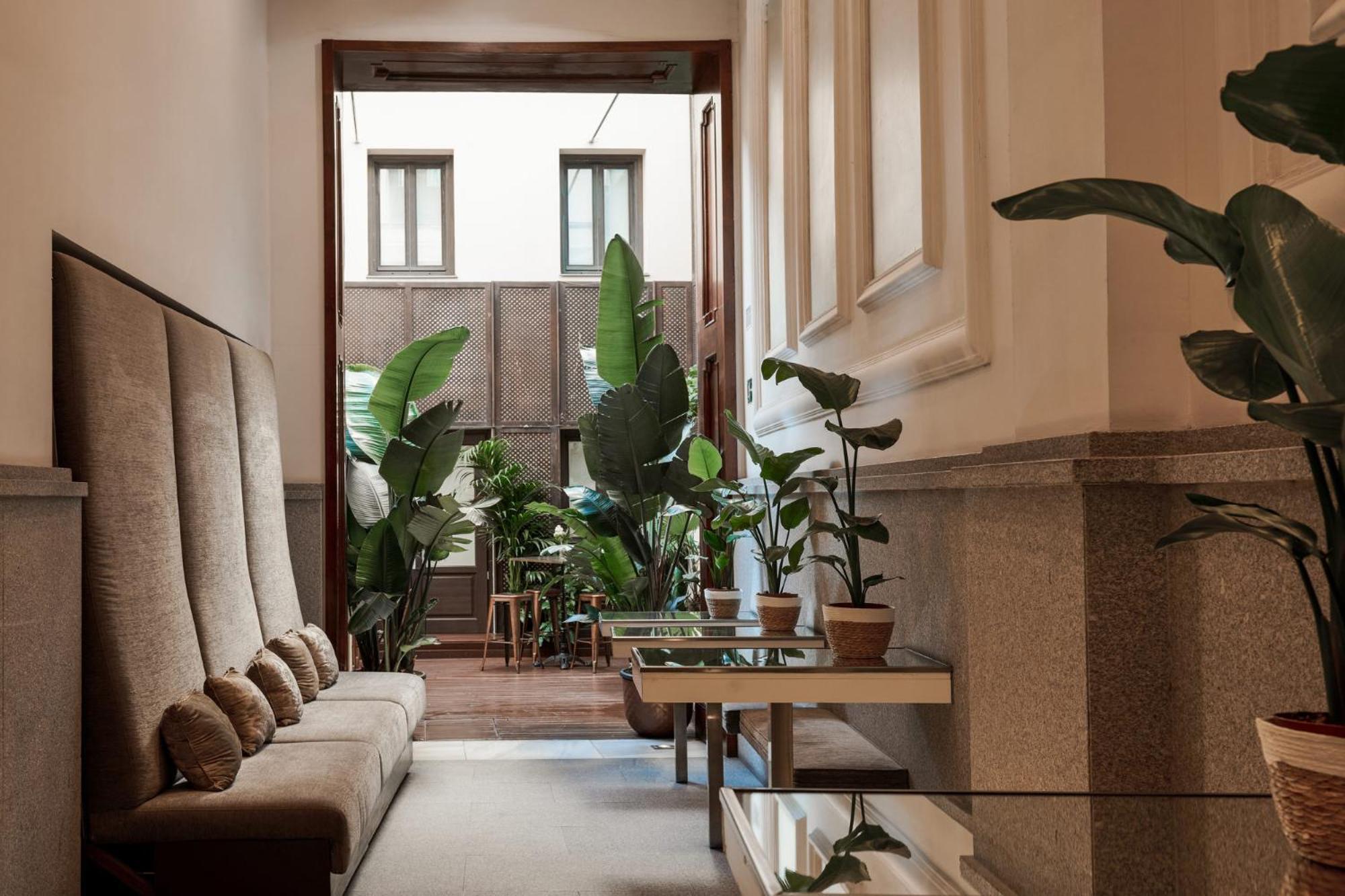 Hotel Hospes Puerta de Alcalá Madrid Esterno foto The interior of the hotel