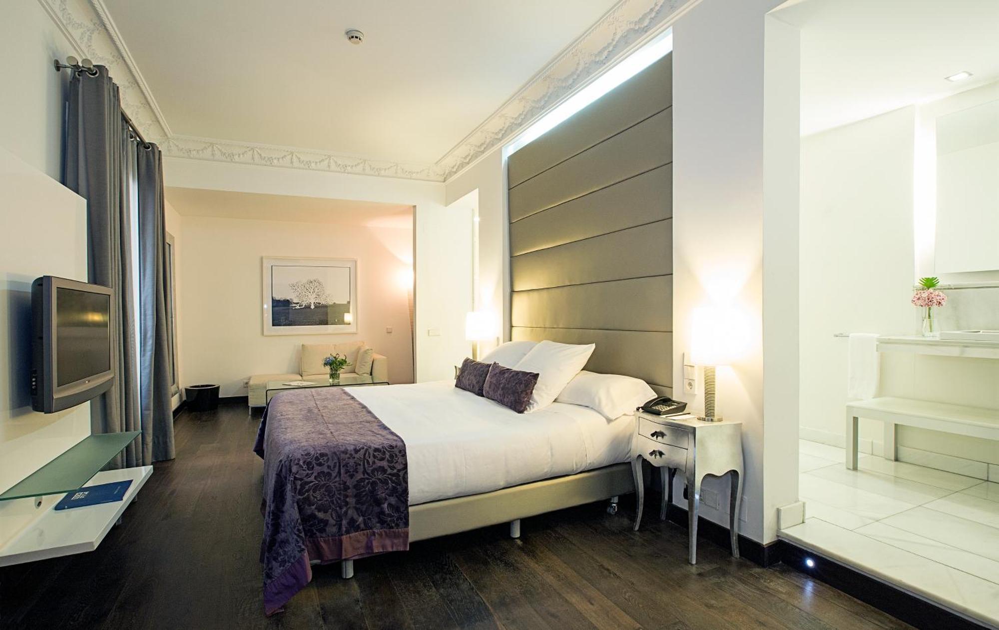 Hotel Hospes Puerta de Alcalá Madrid Esterno foto A bedroom at the hotel